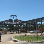 Pastor Good in front of the steel structure